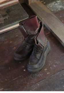 Dotty Webber's boots displayed in Webber Cabin