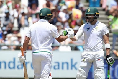 AB de Villiers celebrates his Test fifty with teammate Faf 