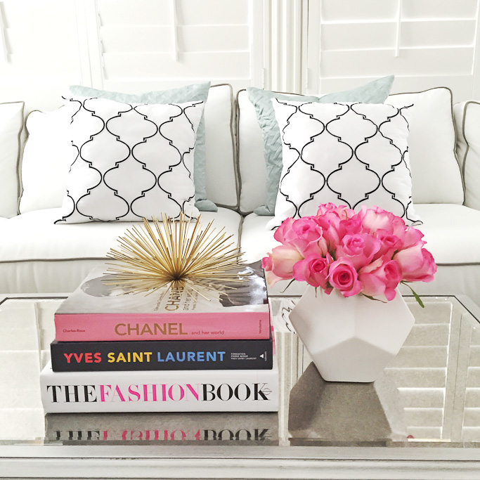 Chanel book Yves Saint Laurent book The Fashion Book Lulu & Georgia accent pillows home decor gold urchin pink peonies