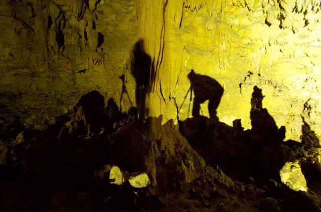 shillouettes, men in cave