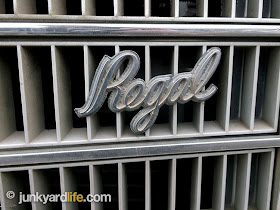 Complete Buick Regal grill and emblem has a few days before it meets the crusher.