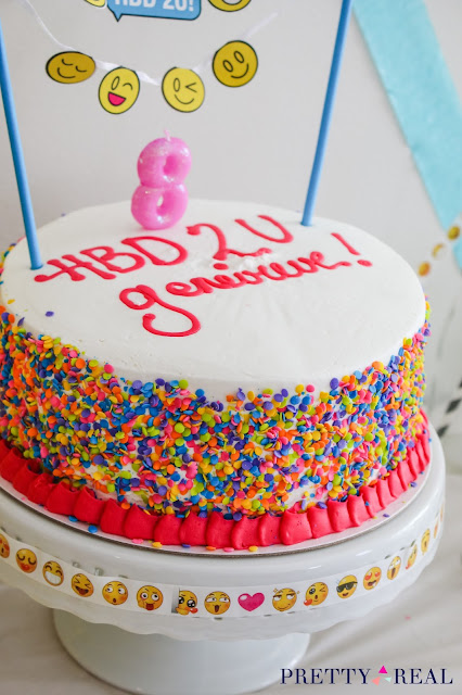 emoji cake topper on an easy to make emoji birthday cake