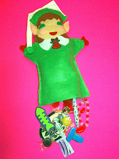 elf puppet filled with goodies