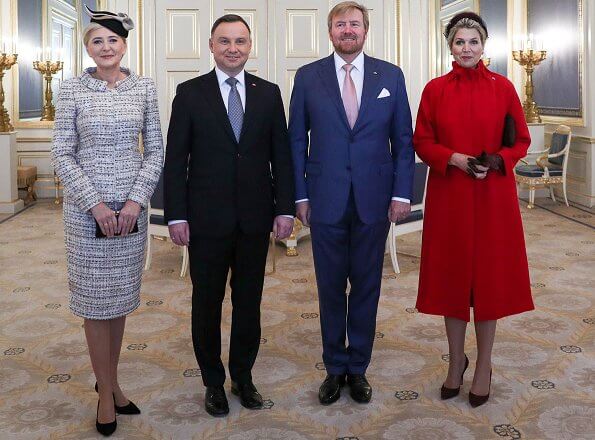 Queen Maxima and First Lady Agata Kornhauser-Duda attended the lunch at Royal Palace. She wore a red wool coat by Natan