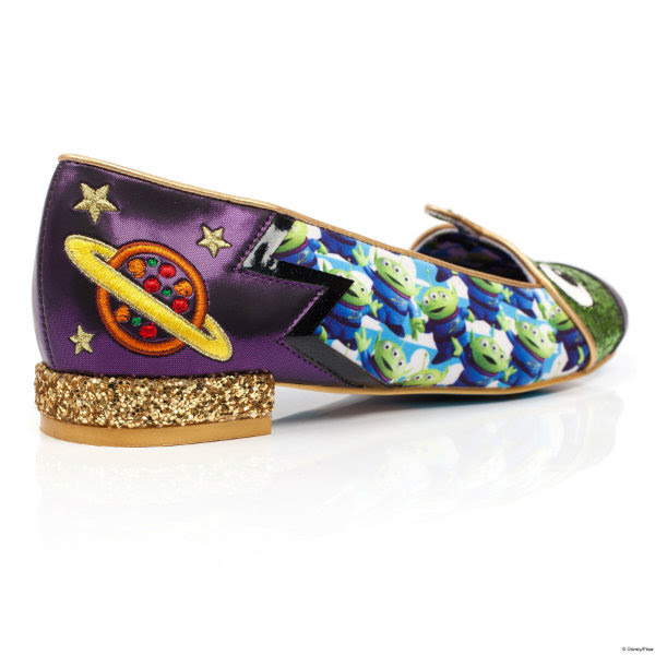 Irregular Choice Eternally Grateful Alien pumps single shoe sitting at angle from heel with purple metallic material, embroidered planet on side and gold glitter heel