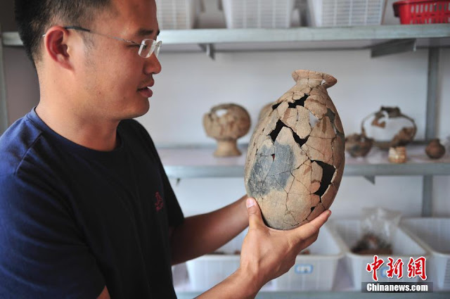 China’s largest shell mound discovered in Yunnan China’s largest shell mound discovered in Yunnan