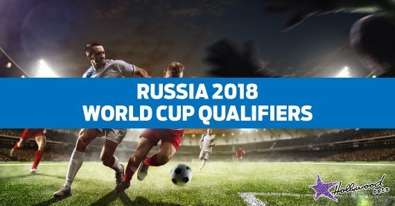 World Cup Qualifiers: Selected Quad Preview Two soccer players chasing the ball down in the big box