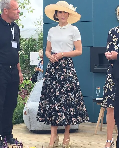 Crown Princess Mary wore Andiata flower print maxi skirt and LK Bennett wedge, shoes, Maria Dulong diamond earrings