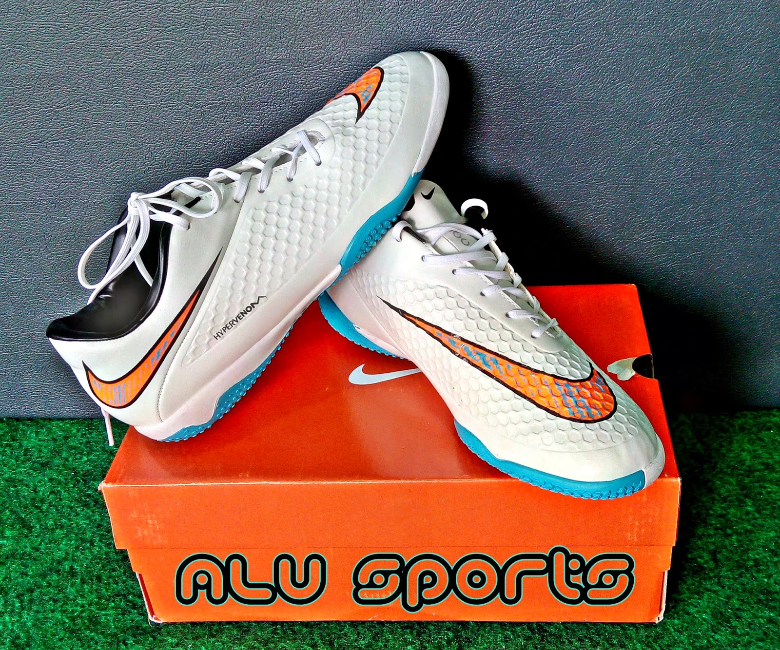 youth football cleats red and black