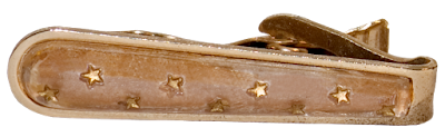 Gold Tie Clip A vintage man's tie clip in gold, with small gold stars on the face.