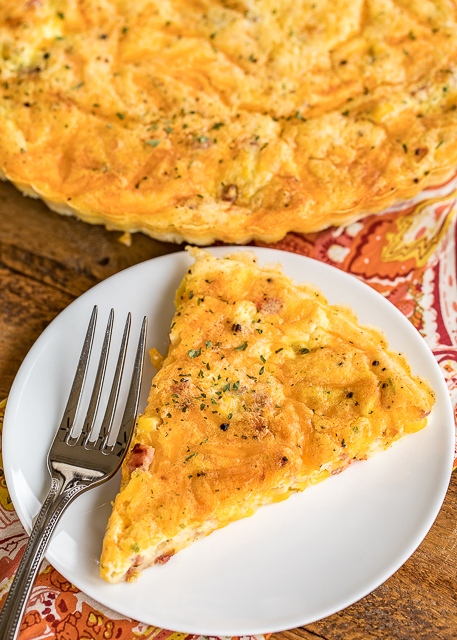 Ham & Corn Pie - crazy delicious! Crustless quiche loaded with ham, corn and cheese. Ready to bake in minutes! Ham, corn, cheddar cheese, eggs, Bisquick and milk. Great for breakfast, lunch or dinner. The whole family loved this easy recipe! #quiche #ham #cheese #kidfriendlyrecipe #dinnerrecipe Ham & Corn Pie - crazy delicious! Crustless quiche loaded with ham, corn and cheese. Ready to bake in minutes! Ham, corn, cheddar cheese, eggs, Bisquick and milk. Great for breakfast, lunch or dinner. The whole family loved this easy recipe! #quiche #ham #cheese #kidfriendlyrecipe #dinnerrecipe