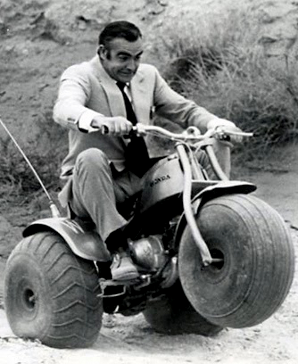 Cling on for dear life !!! Even James Bond Drives A Honda