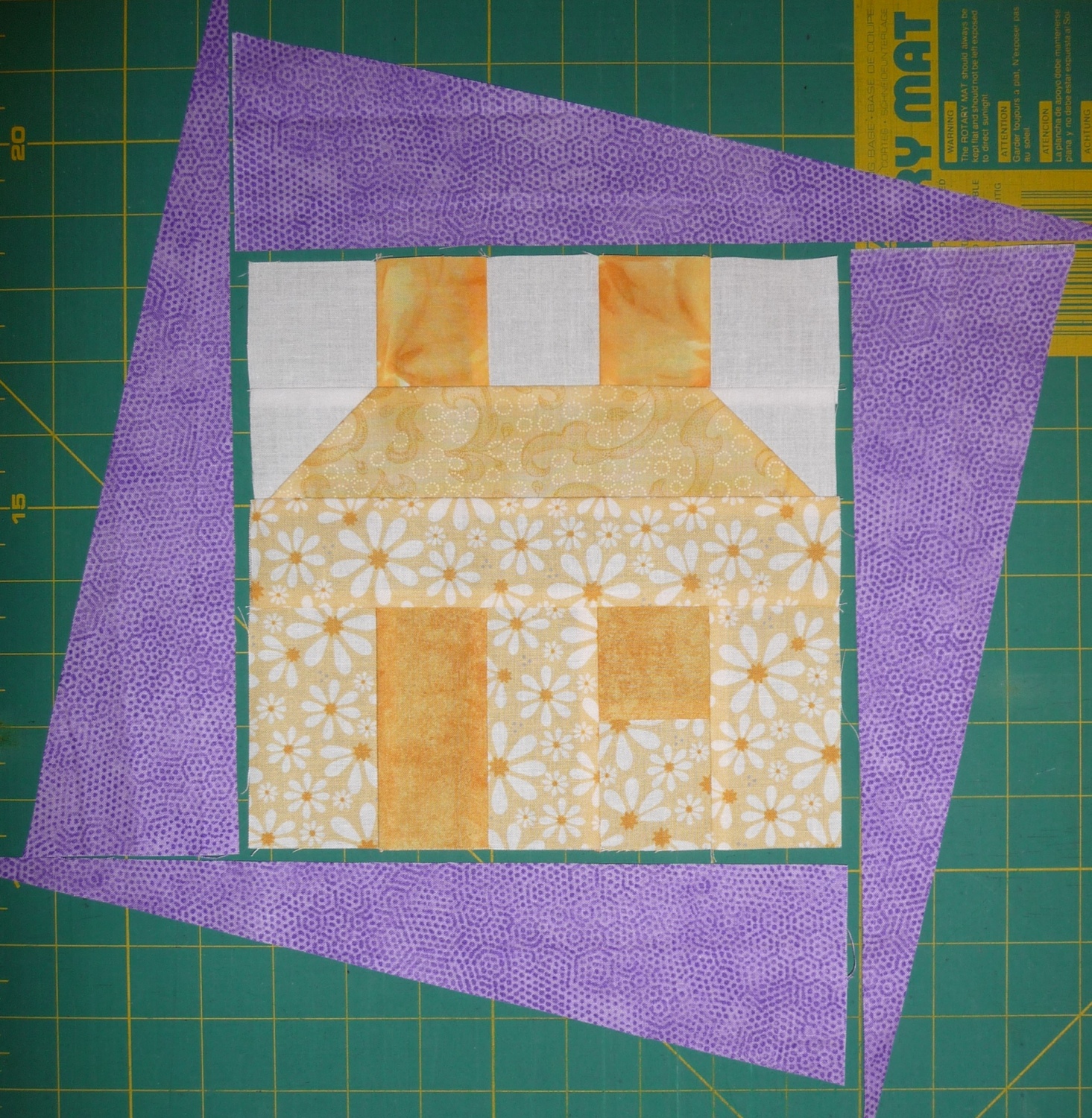 Quilting on the Crescent Scrappy Houses Adding Wonky Borders