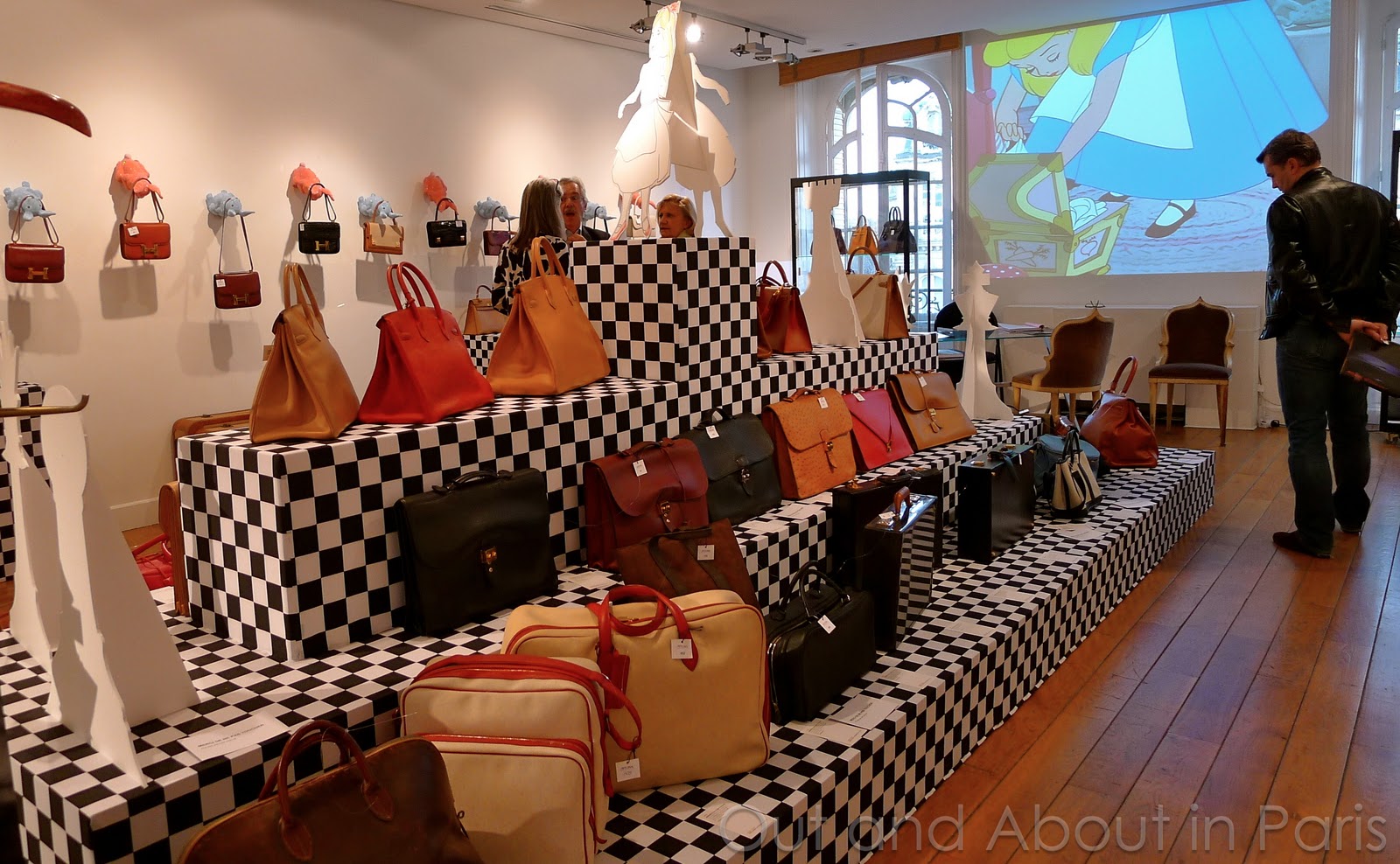 Trying to keep my paddle down at the annual vintage Hermes auction in Paris