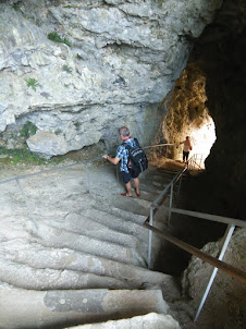 Climbing up the stairs inside "Predjama Cave Castle".