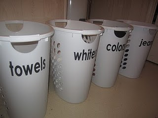 Separated laundry bins with labels :: OrganizingMadeFun.com