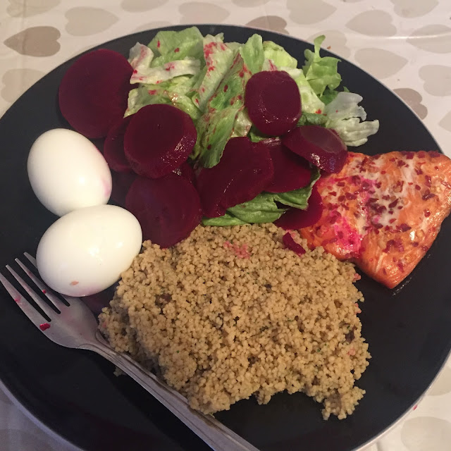 boiled eggs, salmon, salad, beetroot and cous cus