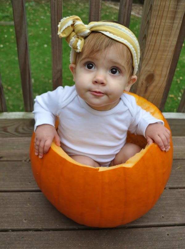 baby in a pumpkin 