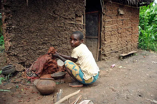 Batwa Woman Prepping Clay to Make Pots in Murwi, Burundi