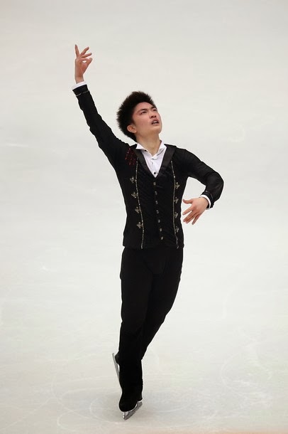 Han Yan (CHN) udfører sit lange program ved Cup of China 2013