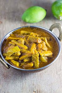 Hagalkai Mavinkai Gojju Hagalkai Mavinkai Gojju Bittergourd Raw Mango Curry Karela Kacche Aam sabzi vegan gravy stew bittermelon indian