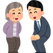 かがんでお年寄りと話す人のイラスト