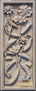 Relief dari batu alam paras jogja / batu putih motif sembilan ikan koi
