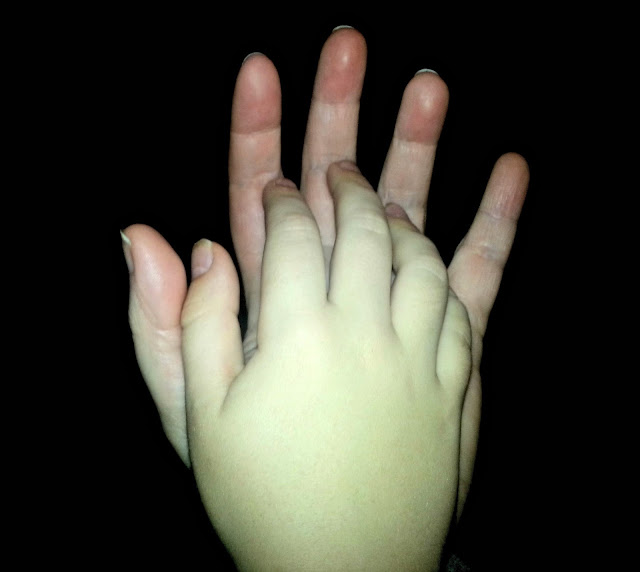 Mother and child hands