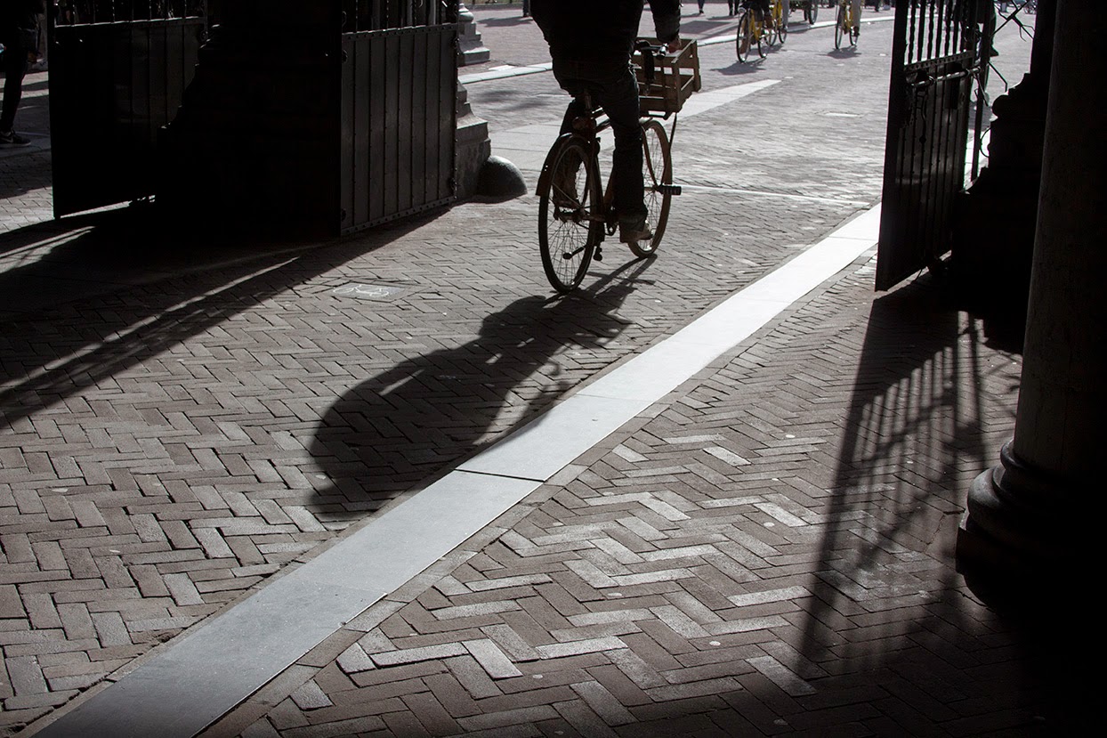 shadow of a man on bicycle, Rijksmuseum, Amsterdam