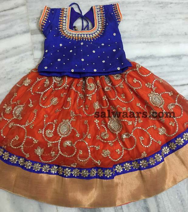 orange lehenga with blue blouse