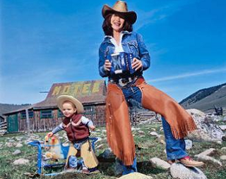 Image: The author and her son Harper, channeling their inner cowpoke outside a lodge she owns in Stanley, Idaho.
