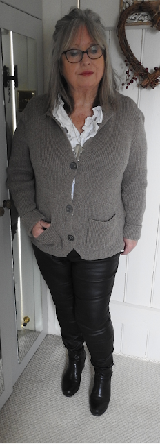 Edgy-feminine-casual over-60s-biker-jeans-and-ruffles-casual