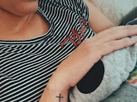 Simple Cross Tattoo On Side Wrist