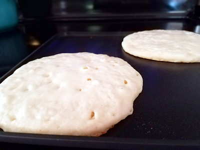 Grain-free pancakes cooking on griddle Gluten-free and vegan pancakes cooking to perfection on the All-Clad 11" square griddle