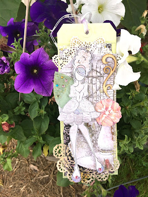 Scraps of Darkness online mixed media and scrapbook store. Monica Lowarance created this sweet Prima Art Doll Tag with items from our store, including Blue Fern Studios paper, Prima Art Alchemy Paint, BoBunny Wood Flourishes, and more. www.scrapsofdarkness.com
