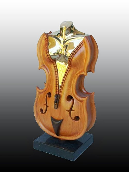 13-Unzipped-Philippe-Guillerm-Musical-Instruments-Sculptures-French-Artist-Musician-Sculptor-Painter-Furniture-Maker-www-designstack-co
