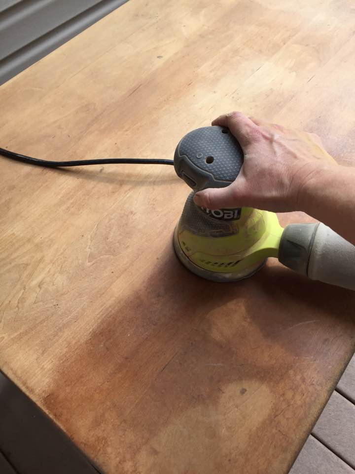 Using an orbital sander on the table top. Using an orbital sander on the table top.