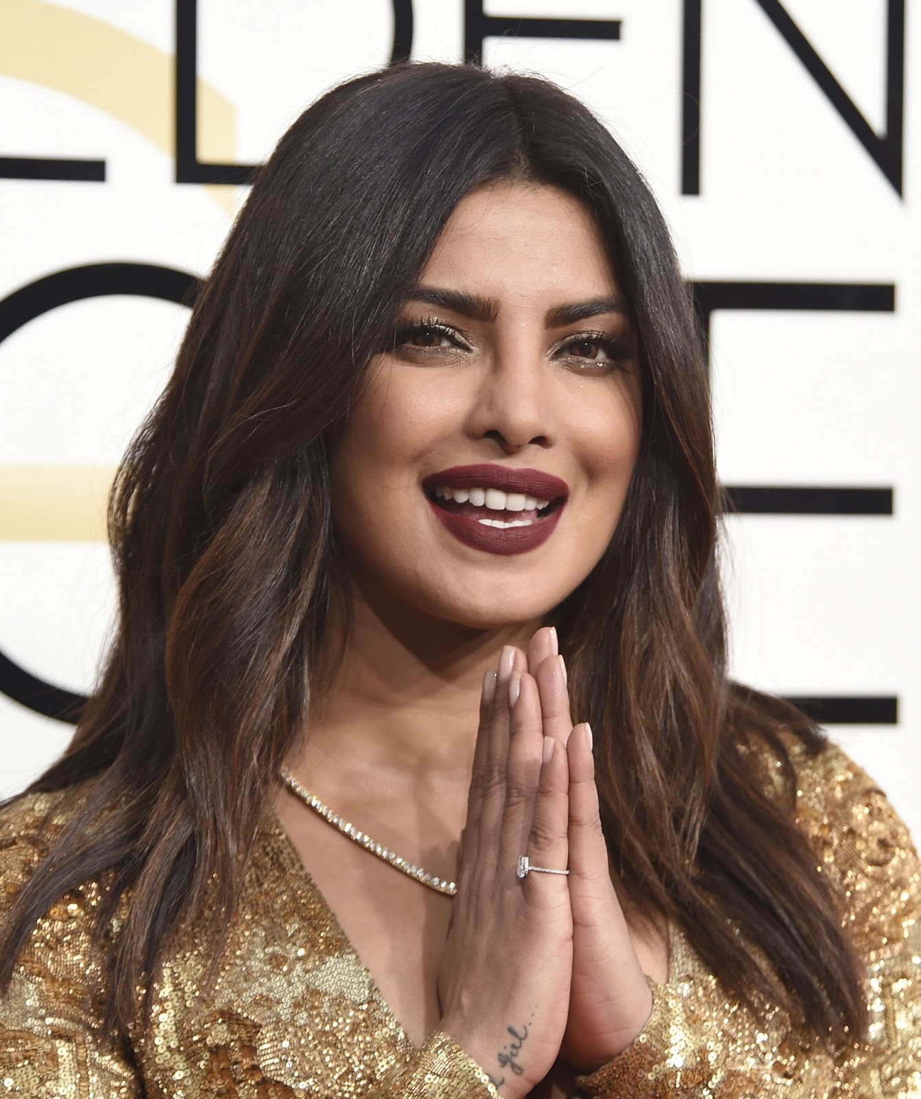 Priyanka Chopra Sexy Cleavage Show at The 74th Annual Golden Globe Awards at The Beverly Hilton Hotel in Beverly Hills