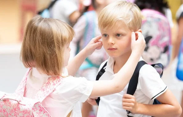 Prince Jacques and Princess Gabriella, twins of Prince Albert and Princess Charlene, started first day of school at Stella School. pink satchel