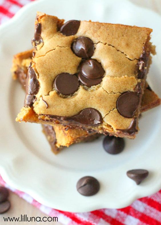 Chocolate Chip Cookie Bars (aka Pan Chewies) - our family's go-to Sunday Night Dessert! It's your favorite cookie in bar-form served hot and perfect with ice cream.
