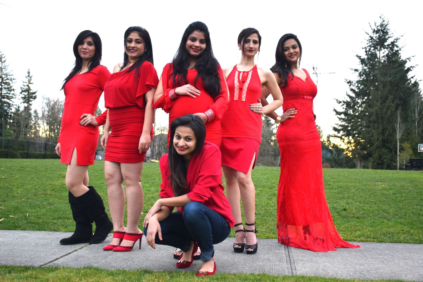 gals all wearing red dress, group pic of indian gals, different types of red dresses, Seattle indian ladies, red lipstick on brown skin  