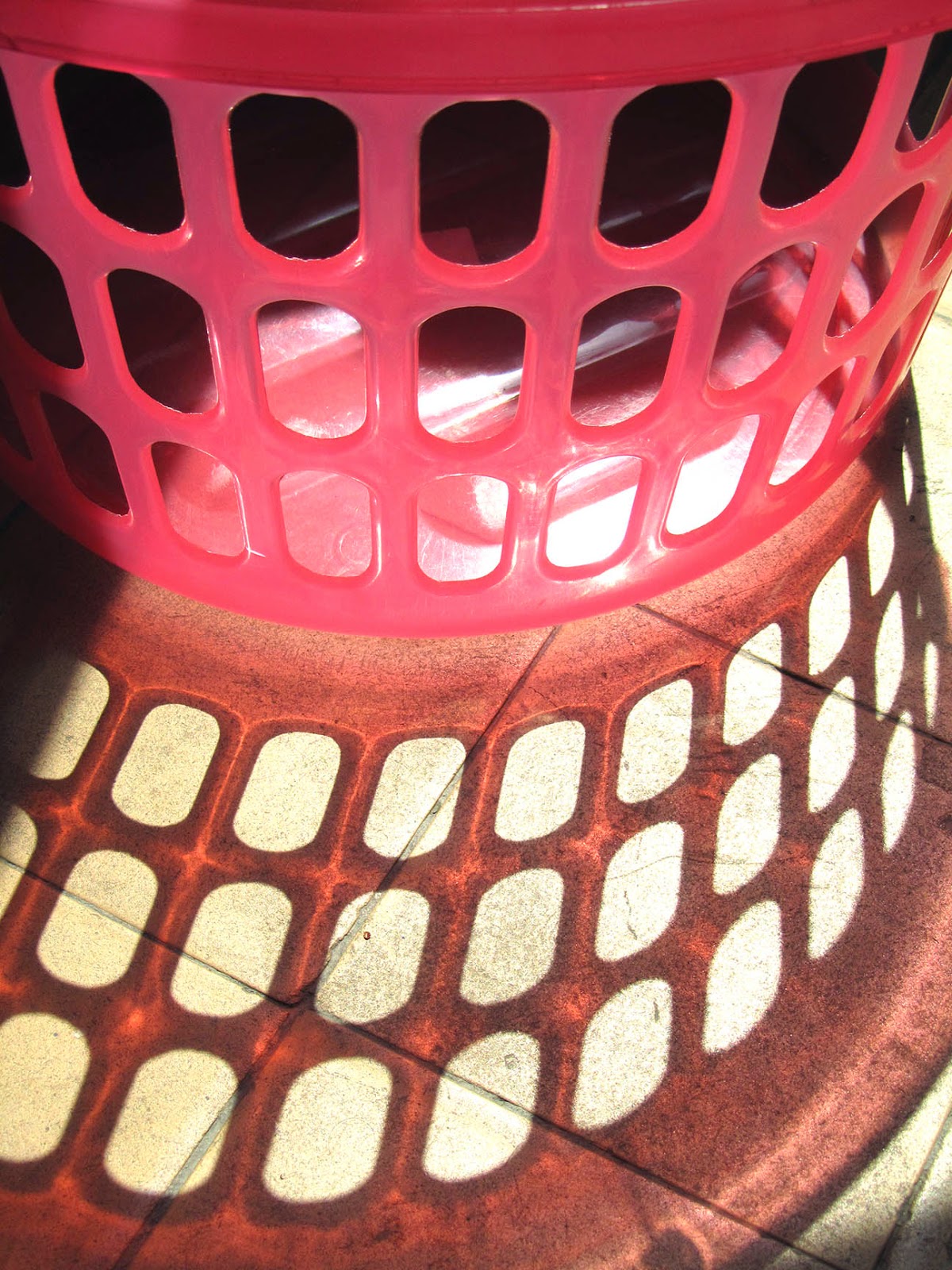 pink laundry basket with shadow