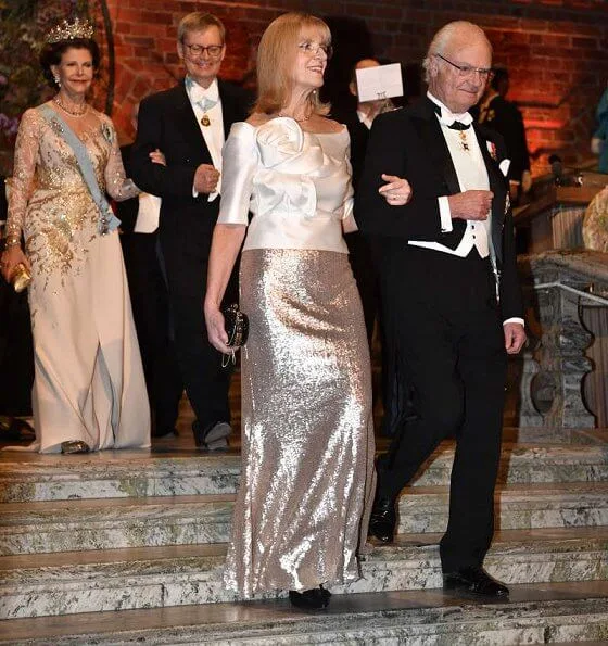 Queen Silvia in Elie Saab. Crown Princess Victoria in Camilla Thulin. wearing Angel Sanchez in pink. Princess Sofia diamond tiara