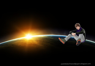 Wallpaper of Justin Bieber Teen Singer photo and wallpaper Justin Bieber sitting in Vatentines Day Concert in classic Space Eclipse background