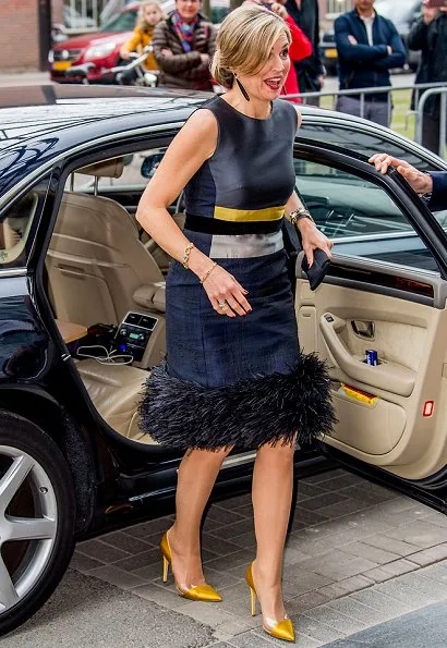 Queen Maxima attends the opening of the StudyPortals in Eindhoven. Queen wore Oscar de la Renta Sleeveless Lame Dress with Feather Hem 