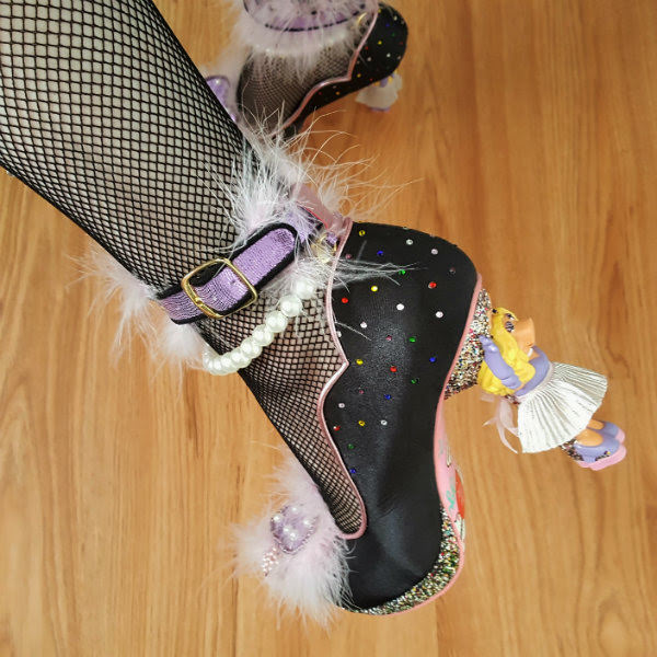 close up of Irregular Choice All About Moi close up of foot wearing satin shoe with Miss Piggy character heel