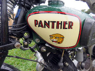 Image of a growling panther appears on gas tank of motorcycle.