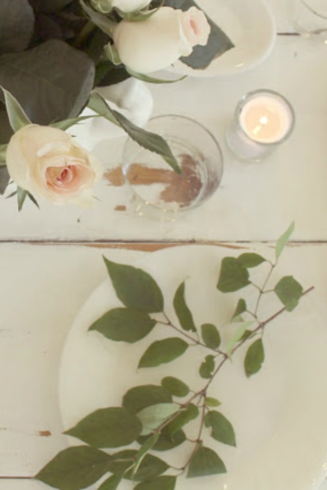 Romantic shabby chic French farmhouse tablescape on white farm table with roses by Hello Lovely Studio