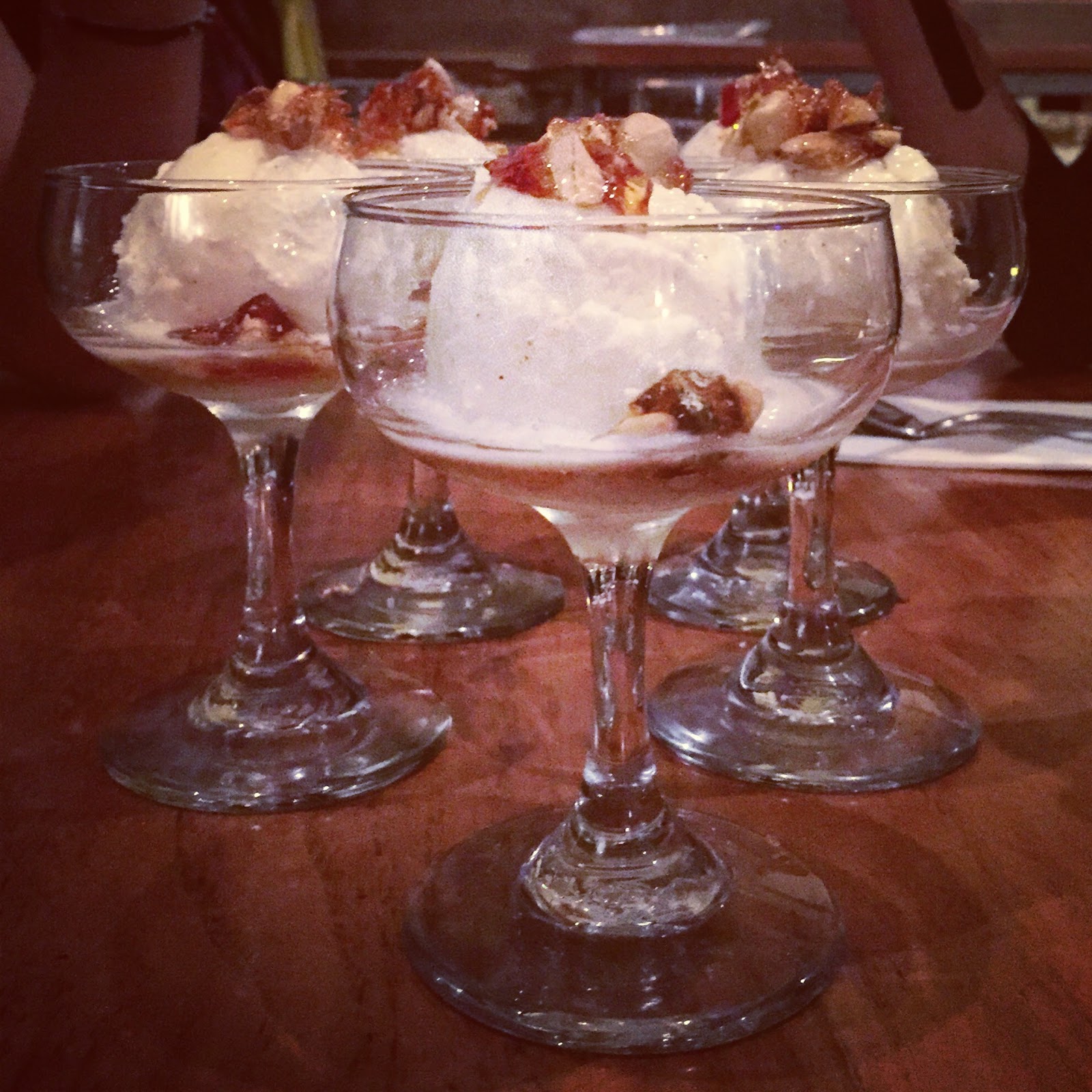 desserts with peanut brittle in cocktail glasses