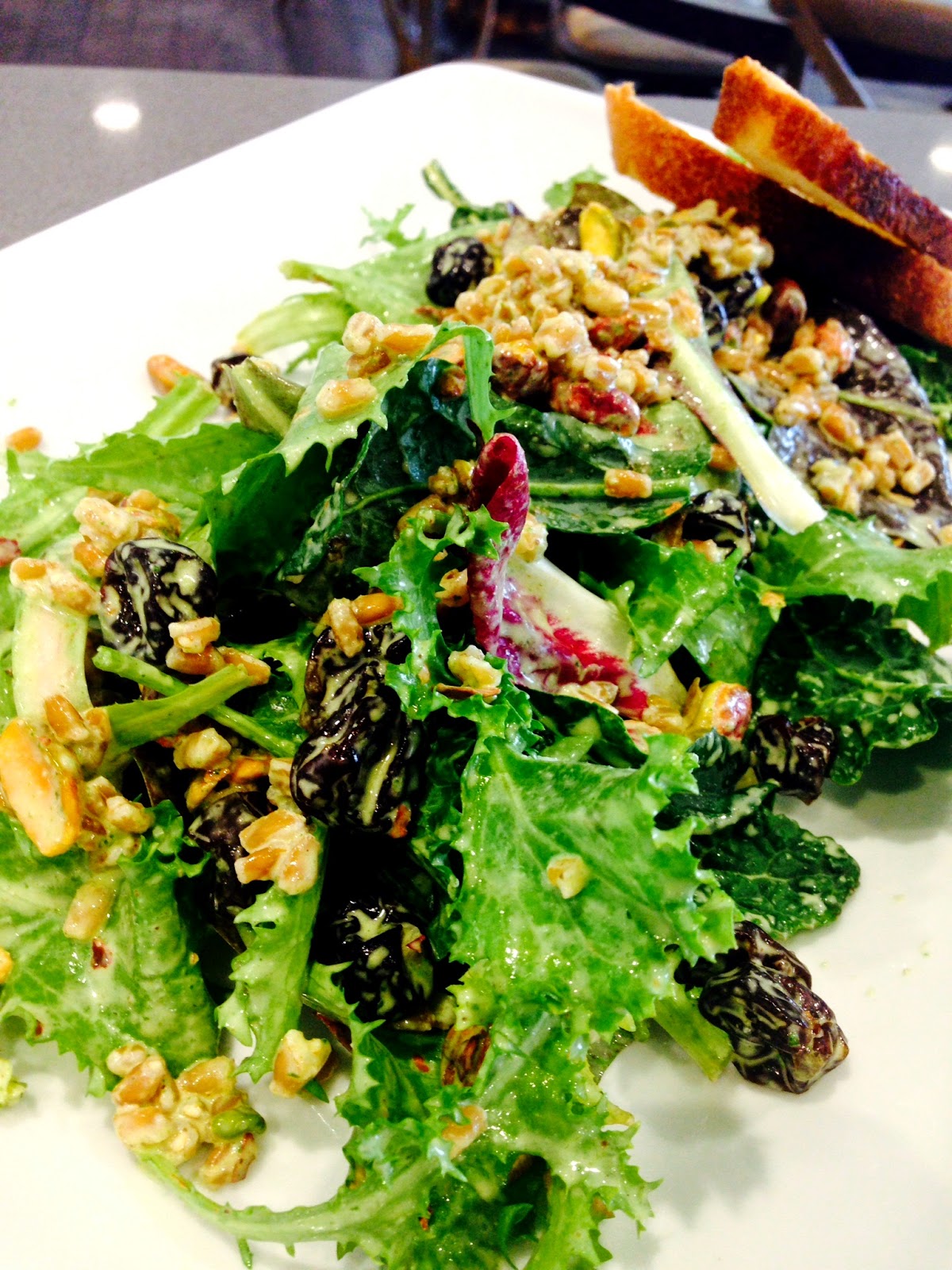 Chef Kelly Salad of Kale & Farro with dried cherries, pistachios and a